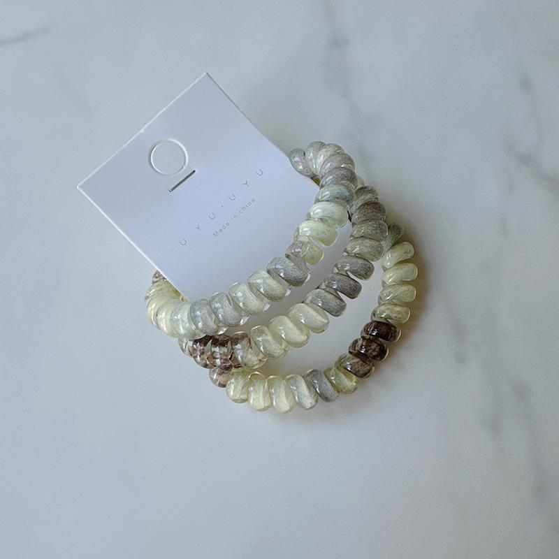 Set med 3 glansiga spiralhårsnoddar i gelélook_voghion.com