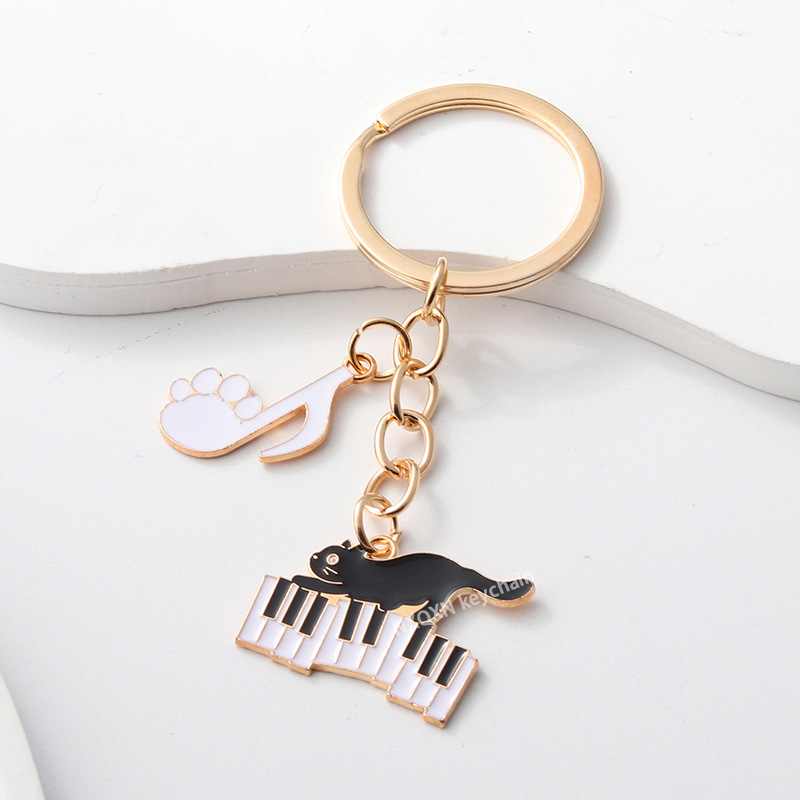 Llavero colgante de instrumento musical con diseño de teclado de violín estilo Chanel, superventas transfronterizo, venta directa de fábrica de Amazon image 17