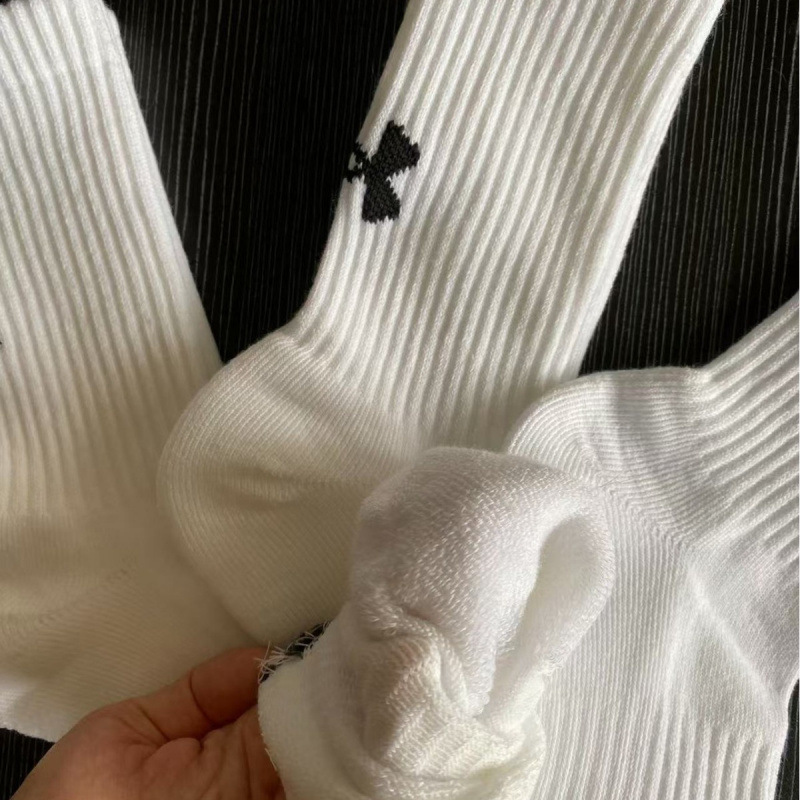 Wholesale Men's Solid Color Black and White Thickened Towel Bottom Outdoor Sports Socks Versatile Casual High Tube Basketball Ua Cotton Socks
