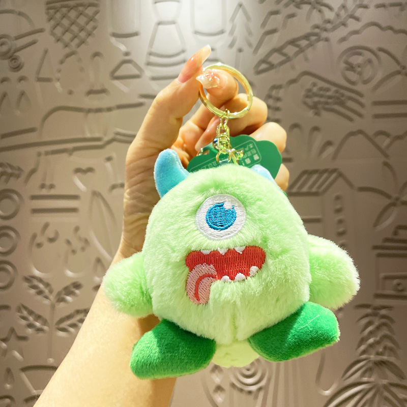 ぬいぐるみのかわいいアクセサリーのぬいぐるみのペンダント卸売りのおもちゃの子供のかばんの漫画の子供の鍵は子供の機械をつかみます。
