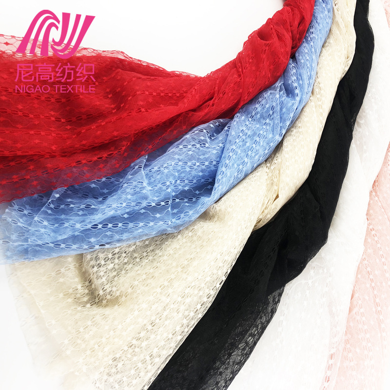 锦纶提花网布 多色现货水波纹薄纱网眼布 新款女装纱裙网纱面料