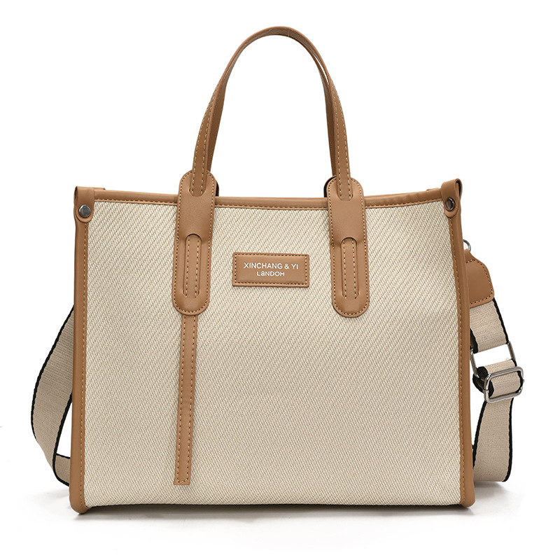 Bolso de gran capacidad para mujer 2025 verano nuevo estilo moda contraste color costura mensajero bolso simple de viaje