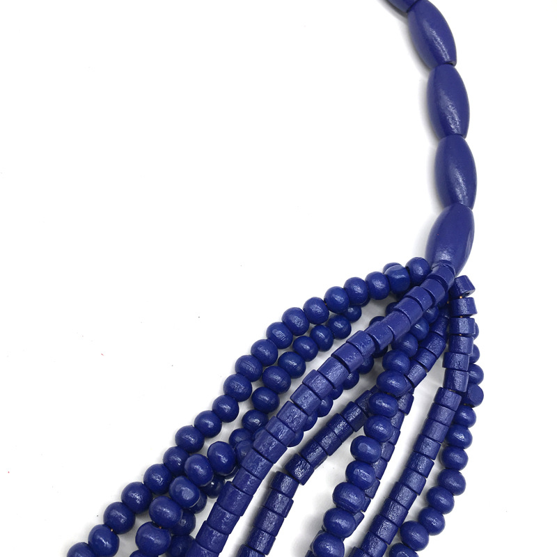 Collana lunga a strati con perle geometriche in legno donna_voghion.com