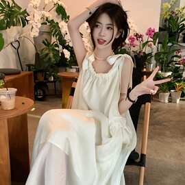 夏季甜美2025新款显瘦时尚温柔风米白色中长款吊带连衣裙女装chic