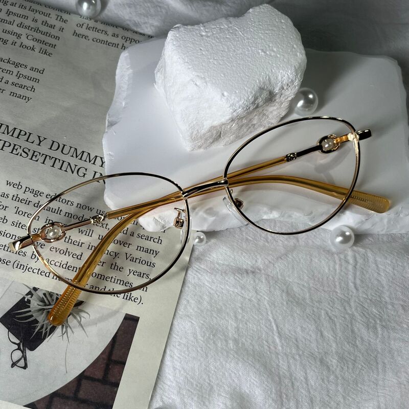High-quality, stylish cat-eye prescription glasses with rose gold accents, available in professional prescription options, small frame, flattering for natural looks, and non-prescription lenses