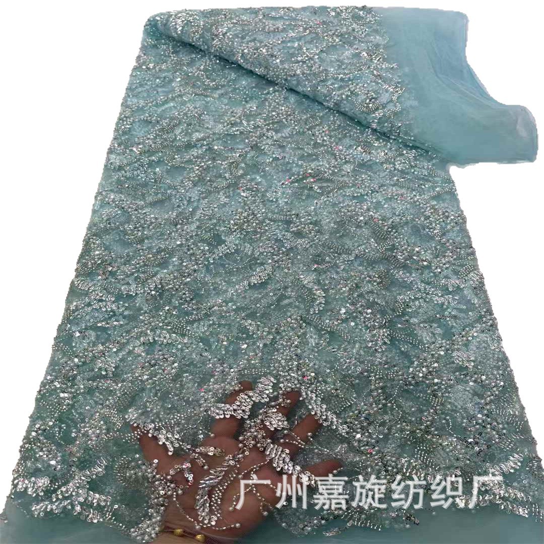 Tela de encaje francés con lentejuelas y cuentas bordadas en tubo con un exquisito patrón irregular al estilo francés para vestido de novia.