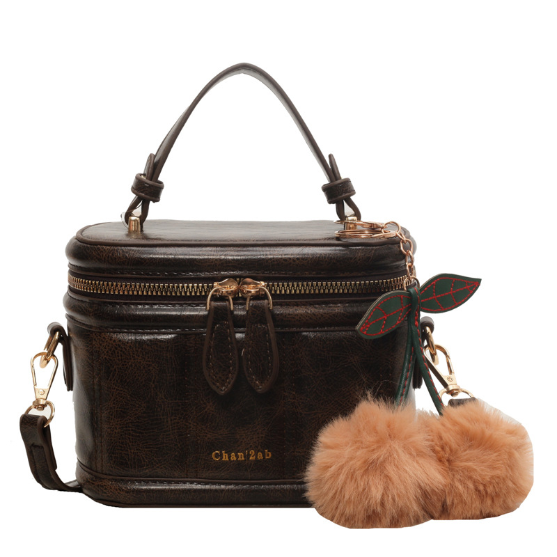 Bolso retro bolso de mano femenino 2025 nuevo bolso cuadrado pequeño de moda de todo fósforo pequeño bolso de mensajero de hombro de alta gama para viajeros de nicho