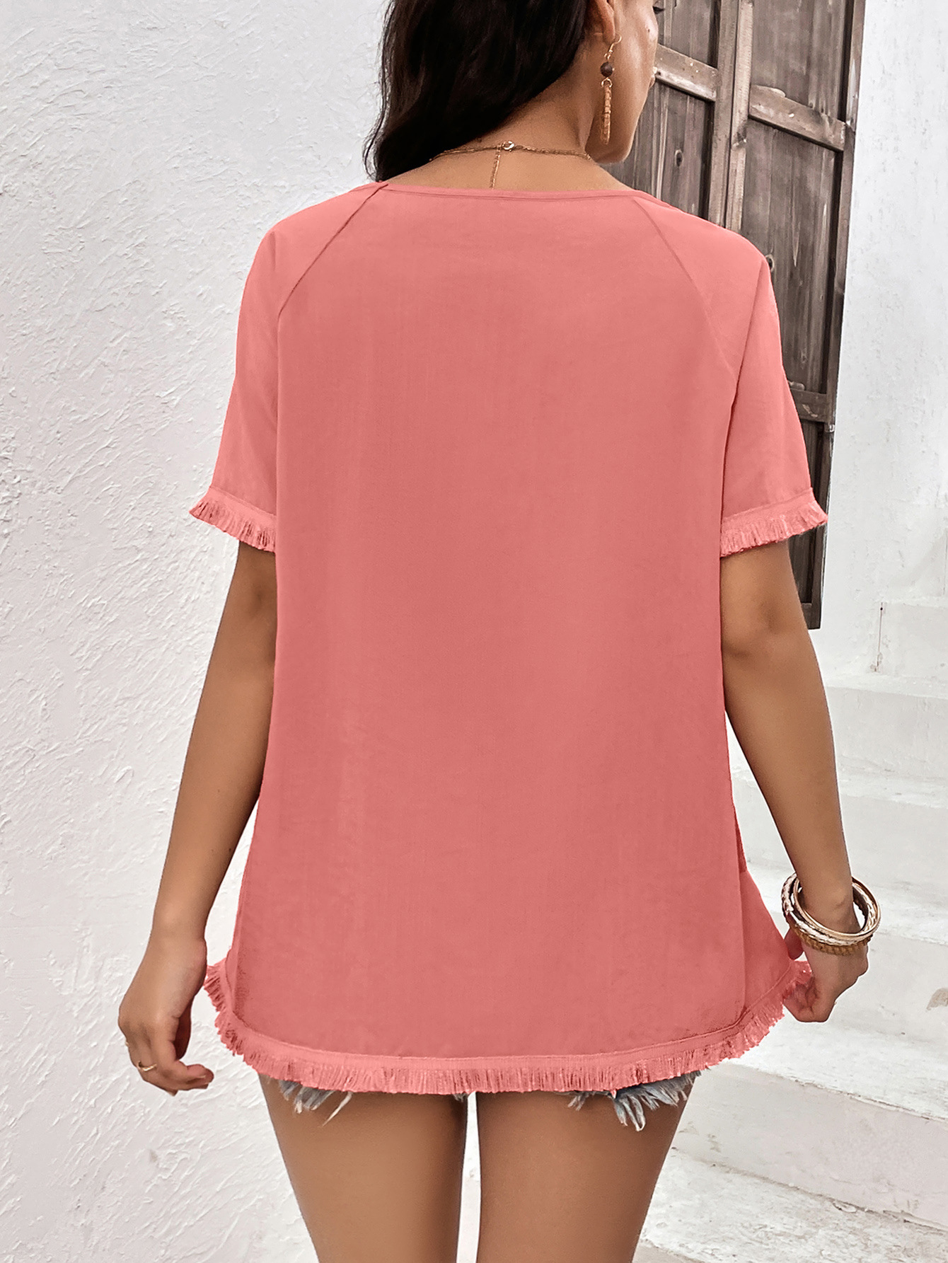 Top casual ampio con scollo tondo e frange da donna_voghion.com