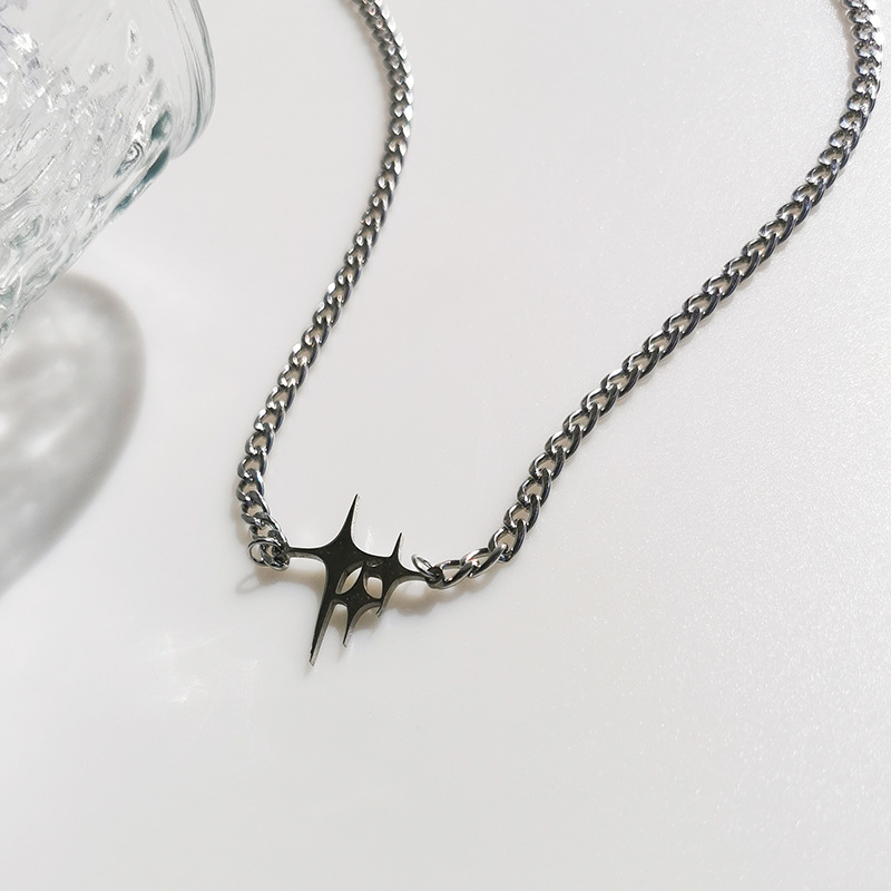 Collier Jackson Wang : Pendentif cubain polyvalent en forme d'étoile, style hip-hop haut de gamme, en acier titane pour homme_voghion.com