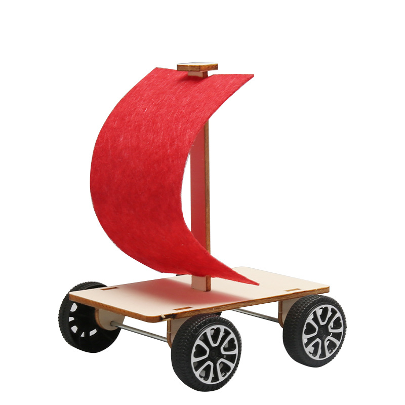 Tecnología de madera pequeña producción pequeña invención DIY Escuela Primaria estudiante viento coche vela coche vapor equipo de educación experimental