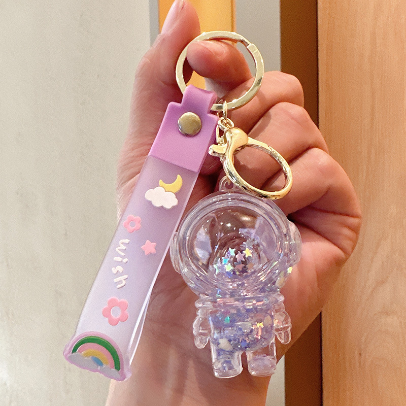 Luminous transparent liquid astronaut keychain astronaut quicksand bottle pendant cartoon creative gift school bag pendant