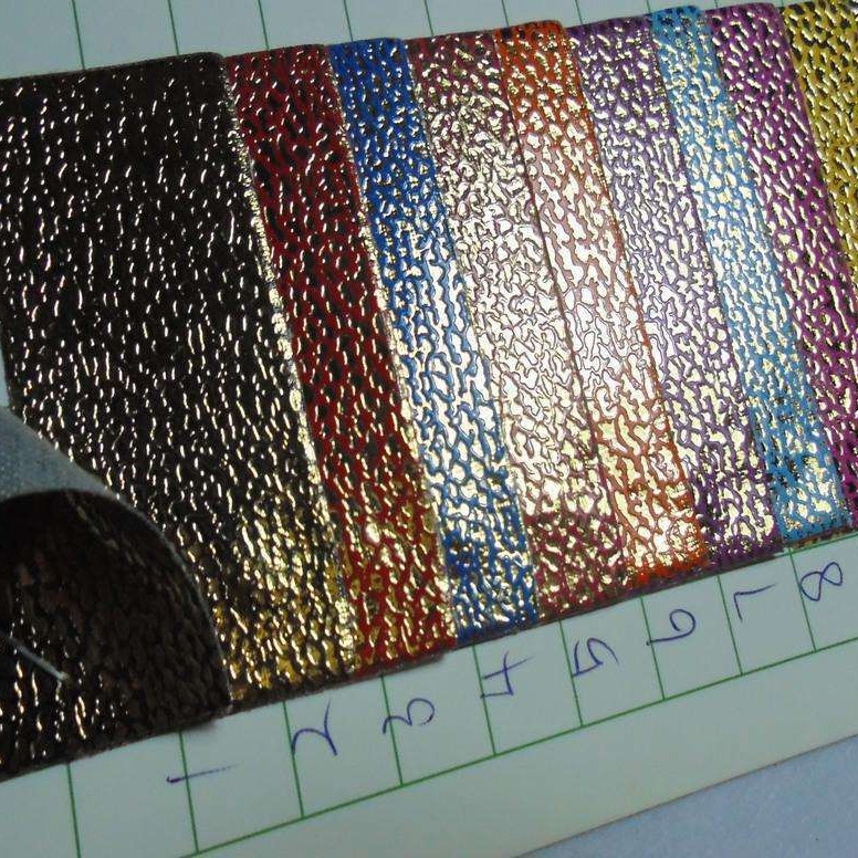 七彩爆裂纹板凳桌椅家具包边革 幻彩凹凸压花爆裂纹面料