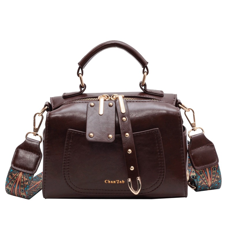 Bolso de viajero retro transfronterizo para mujer 2025 nuevo bolso de Boston casual simple moda bolso de mensajero portátil de todo fósforo