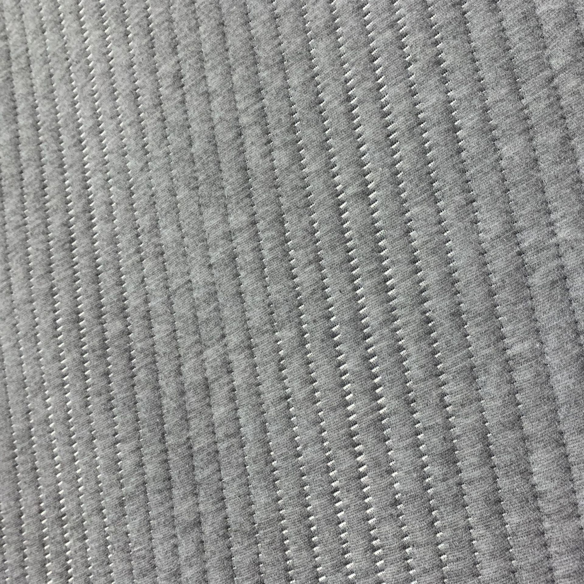 Los fabricantes suministran 180g de tela de colchón gris cáñamo con tela funcional de colchón jacquard de punto de fibra magnética de vida