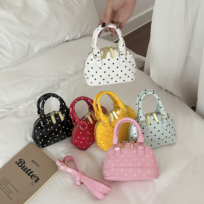 Cross-border polka dot shell women's bag, mini handbag, niche commuter light luxury stylish versatile patent leather children's crossbody bag