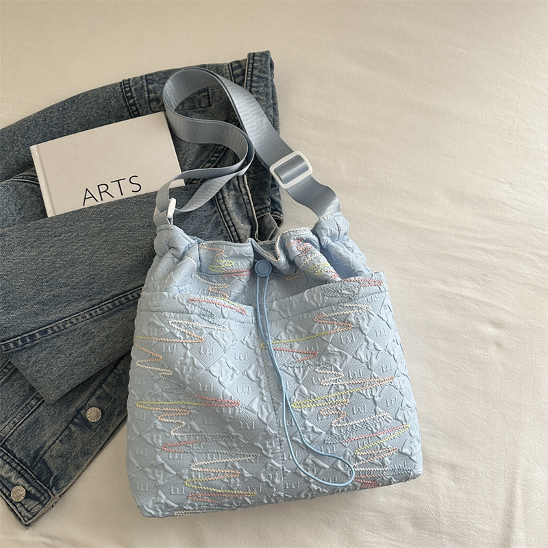 Bolsas de primavera y verano de mujeres de gran capacidad 2025 nuevo pequeño paquete de hombro, bolsas de viaje, bolsas de ocio plegadas