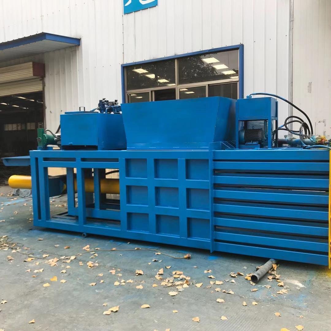 全自动液压打包机视频无纺布废纸卧式打包机振德塑料瓶金属打包机