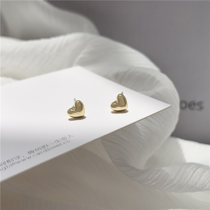 Pendientes de aro lisos para mujer, lujo ligero, pendientes de alta gama, pendientes populares, aretes de diseño exclusivo, aretes de otoño e invierno al por mayor