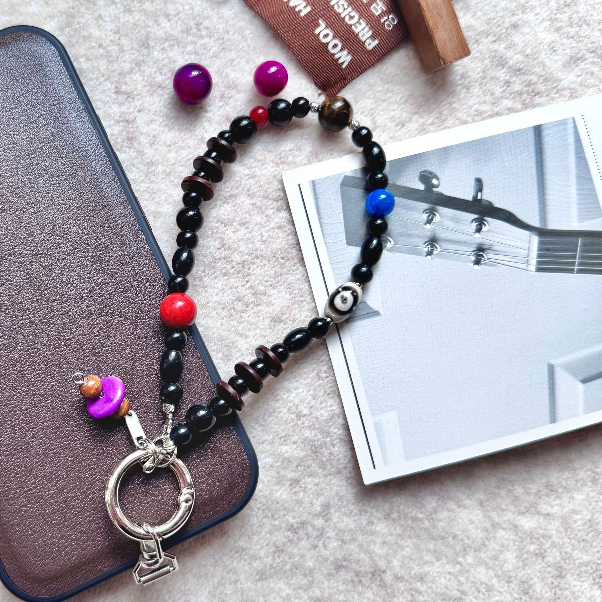 Boutique hecha a mano y de alta calidad, colgante de teléfono móvil de estilo chino, colgante de ojo de tigre, colgante de moda corto para teléfonos móviles