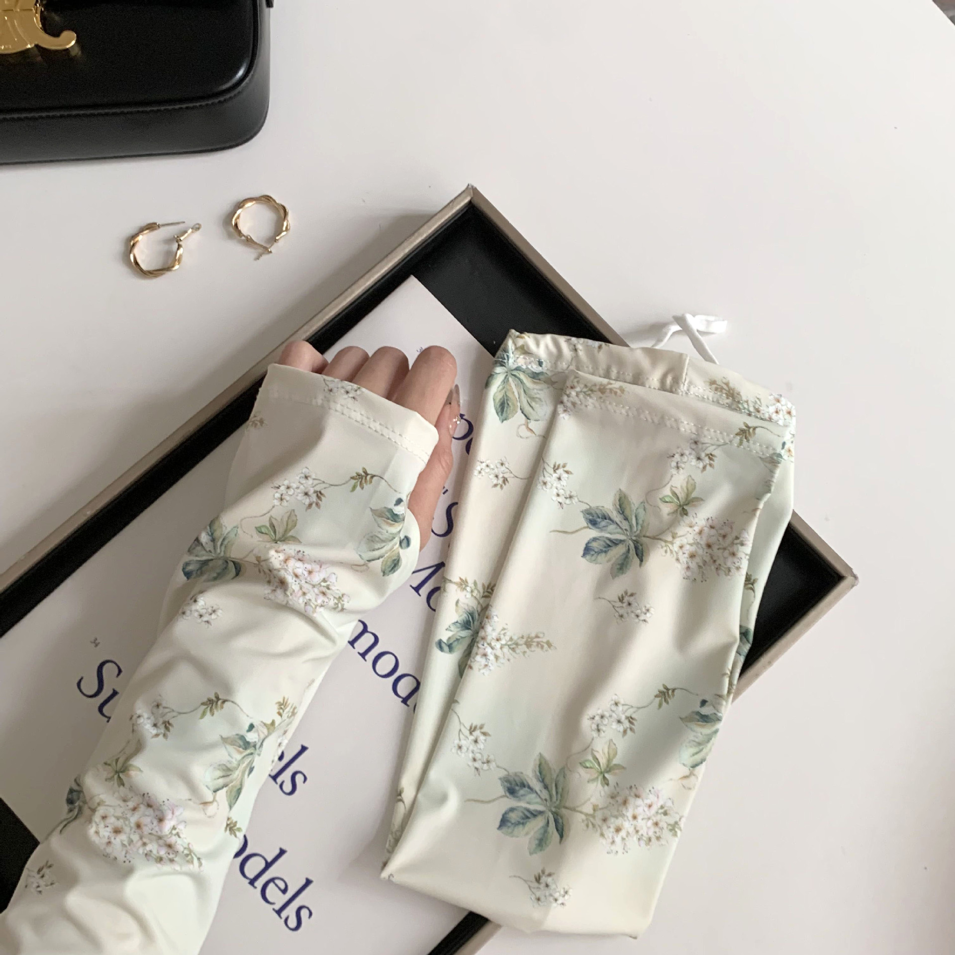 Protector solar manga de hielo manga de seda de hielo nuevo estilo nacional protección UV flor cordón manga de hielo protector de brazo transpirable suelto