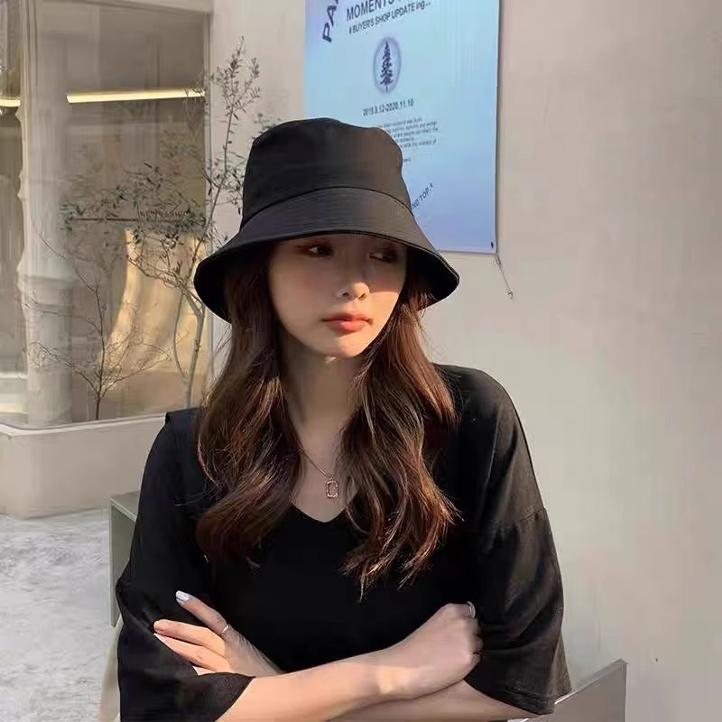 Sombrero de mujer moda casuales sombrero de pescador negro sombrero de protección solar amplio borde coreano simple sombrero de viaje al aire libre