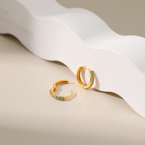 Earrings with a cool and chic style, plated with 18K gold, featuring a circle design with micro-set turquoise accents, embodying a light luxury feel.