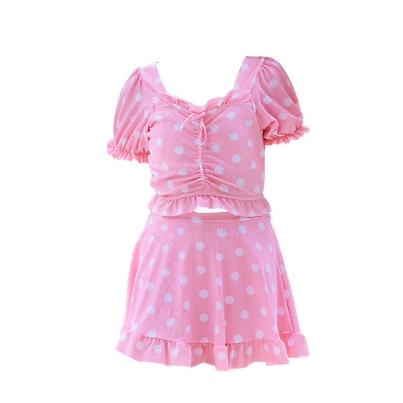 trajes de baño de niñas 2025 nuevo pequeño fresco tipo de falda dividida para niños jóvenes dulces falda de punto de onda conservadora trajes de baño de vacaciones