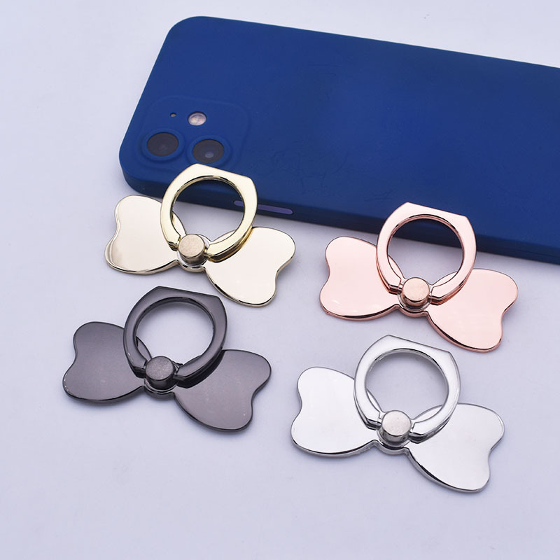 Supporto da tavolo per telefono da donna con nodo a farfalla in metallo a 360°_voghion.com