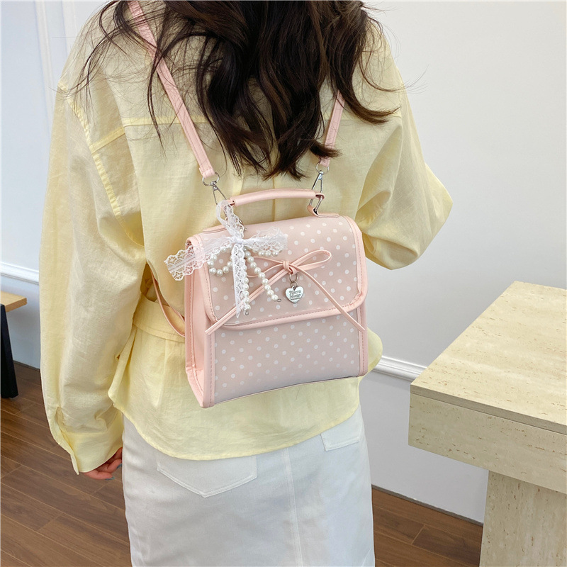 Bolsa de moda coreana lindas bajo las axilas 2026 primavera nueva bolsa de viaje simple, mochila de moda casual de alto valor.
