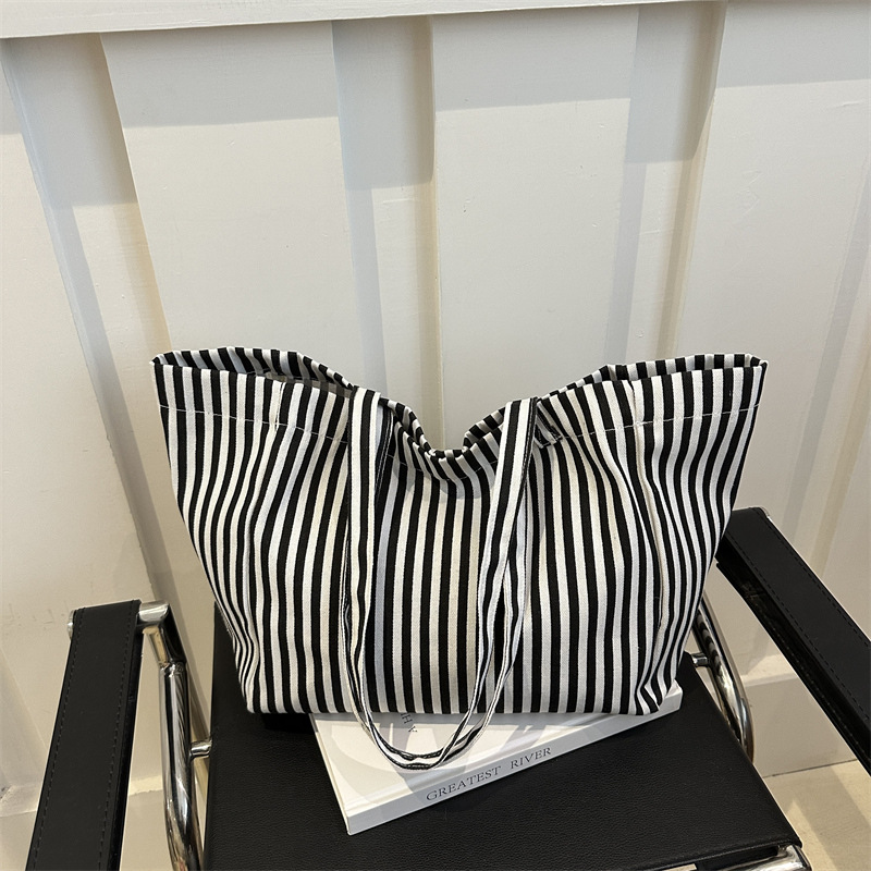 Bolsas de lona a rayas de otoño de mujeres bolsas 2024 nuevas bolsas de mano populares bolsas de hombro casuales de gran capacidad bolsas tote