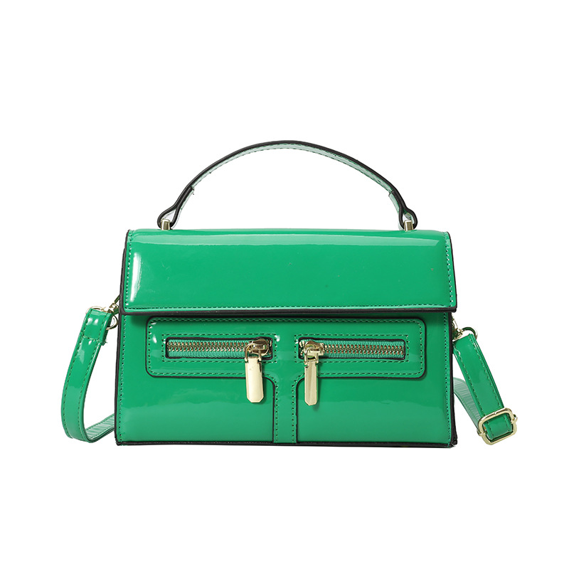 Bolso de diseño de nicho 2025 verano nuevo bolso femenino de alta calidad textura bolso de hombro charol brillante bolso de mensajero marea