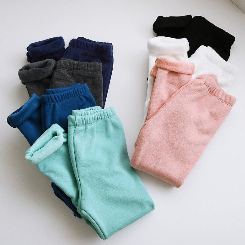 Otoño e invierno niños y niñas color puro más leggings de algodón de terciopelo japonés y coreano europeo y americano Comercio exterior ropa para niños pantalones gruesos para niños medianos y grandes a juego