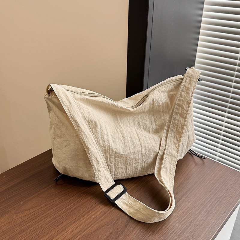 大容量尼龙托特包包女2026新款潮大学生上课斜挎包百搭通勤单肩包