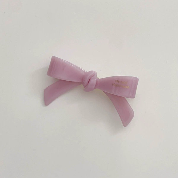 With bow, purple
