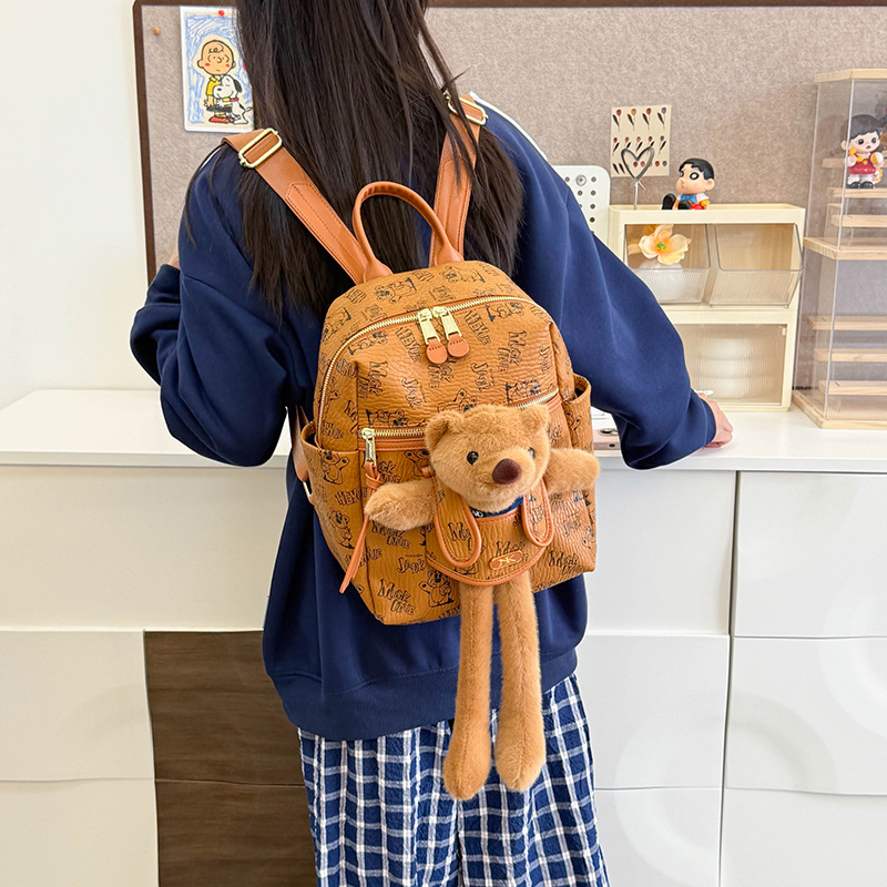 Mochila de mujer impresa de aire extranjero caricatura lindo oso muñeca mochila de niña de gran capacidad de viaje mochila