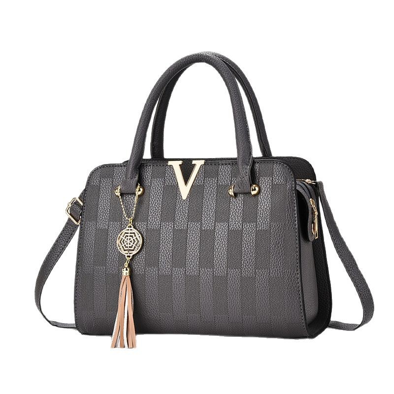 Nuevo bolso de mensajero de un solo hombro de todo fósforo estilo coreano bolso de mujer de mediana edad atmosférico bolso de madre bolso de moda simple bolso grande primavera y verano