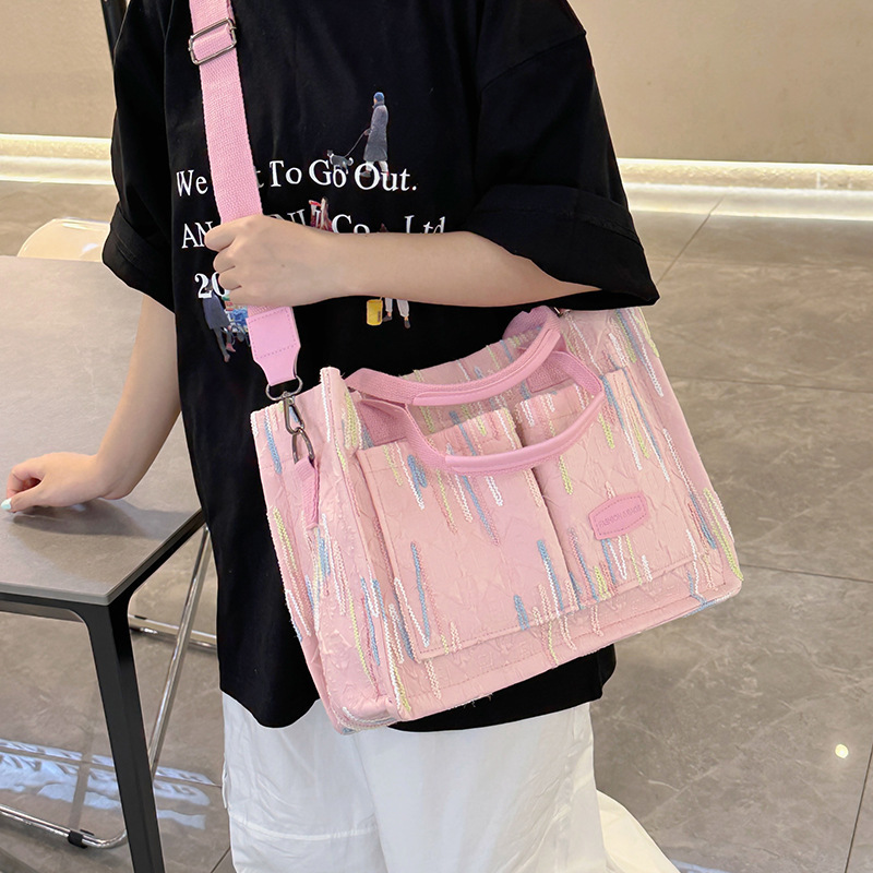 2024 estilos explosivos transfronterizos, sentimientos de alto nivel de nicho, mochilas escolares para estudiantes de salida, bolsos de moda de alta capacidad, bolsos de ocio de alta capacidad