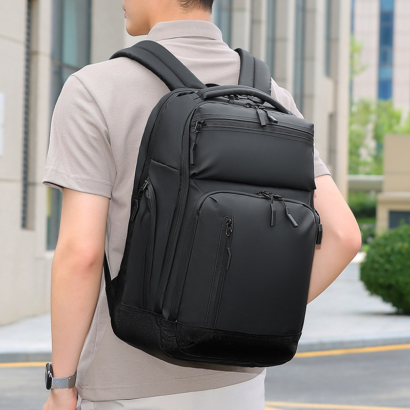 Bolsa de comercio exterior de color sólido de gran capacidad multicapa colgante barra de tracción de negocios bolsa de computadora de negocios mochila a prueba de salpicaduras