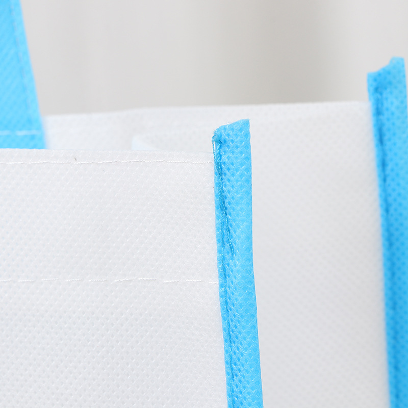 Bolsa de tela no tejida de costura de automóvil cubierta de película en blanco bolsa de tela no tejida engrosada bolsa de regalo resistente al desgaste bolsa de compras de mano