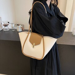 レトロ大容量ショルダートートバッグレディースバッグ2025新しいファッションシンプルな通勤母と娘のバッグ