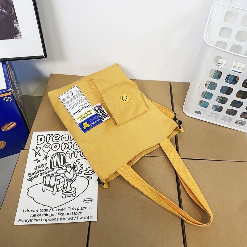 Nuevos hombres y mujeres de estudiante universitario bolsa de lona de moda crossbody bolsa de estilo coreano japonés casual bolsa de hombro de gran capacidad