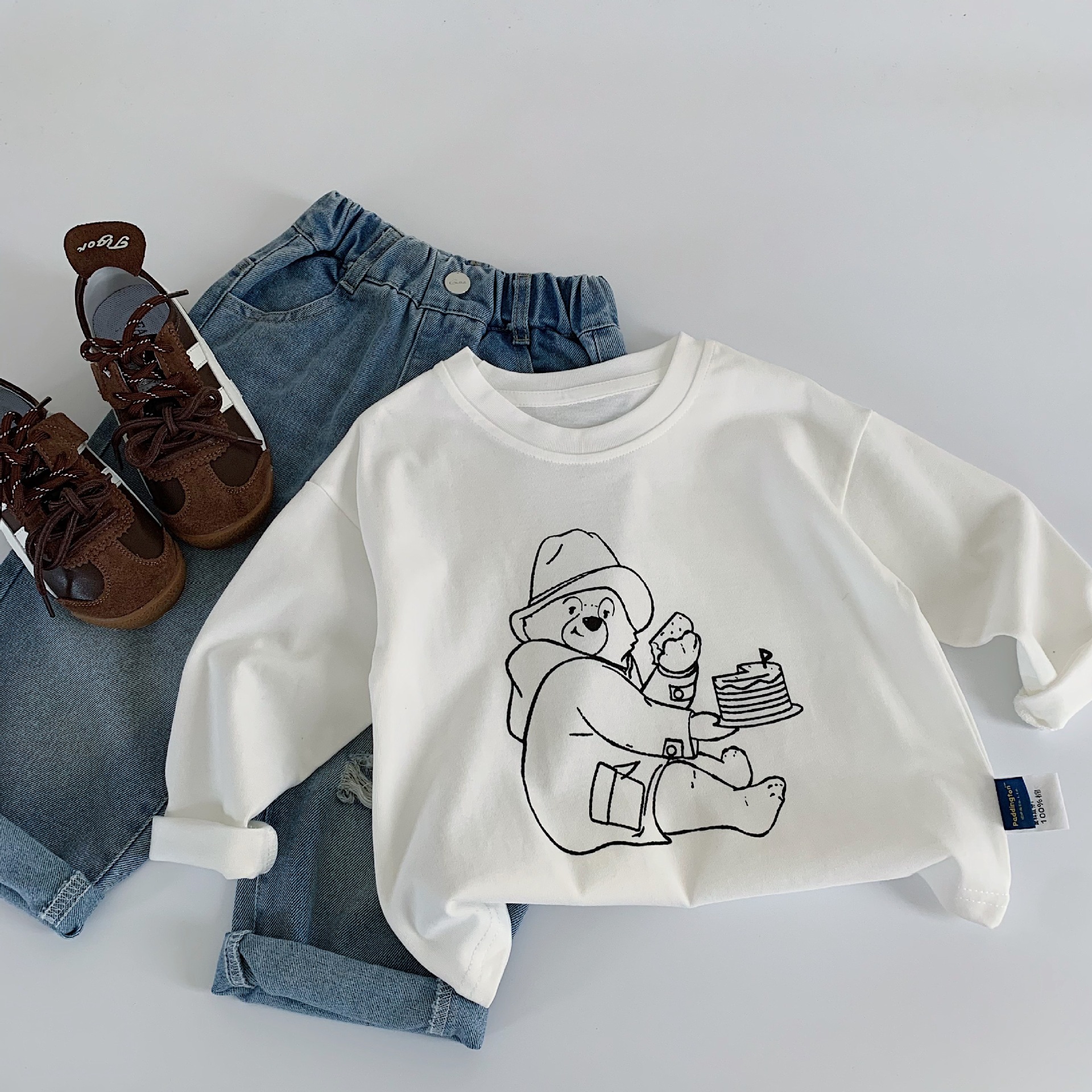 Mai Bao otoño camiseta infantil 2025 bebé caricatura Paddington oso blanco camiseta de base de tela ropa infantil de moda