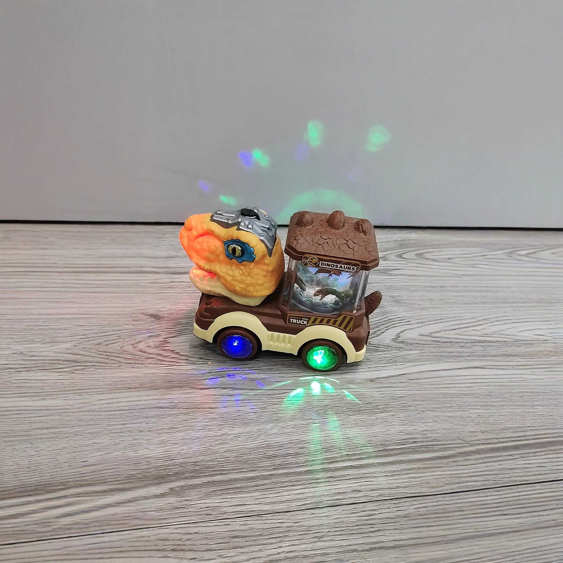 Transfronterizo de dibujos animados para niños coche eléctrico universal spray dinosaurio coche de ingeniería Tyrannosaurus Rex juguetes para niños de 3 - 6 años