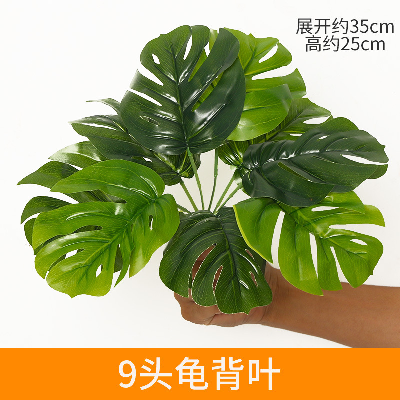 Simulated plant wall with plastic materials, green accessories, fake plant decoration, living room film and television wall background, green plant wall