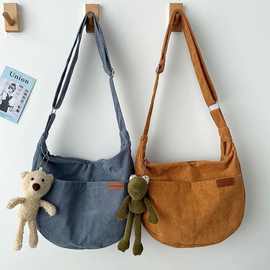 斜挎包大容量帆布包2022新款日系小挎包小众大学生书包百搭饺子包