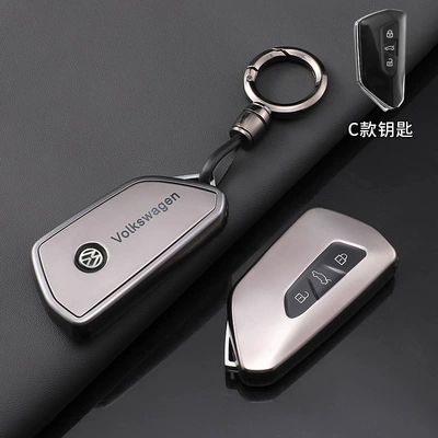 Static Rod/Key Bag: Protective Shell Buckle - volkswagen-c-model-titanium-gold-with-bright-gun-round-buckle