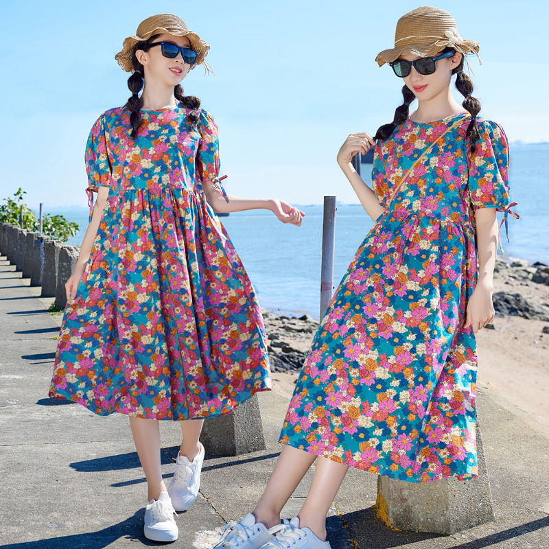 Vestido para niñas de manga corta Verano 2024 nuevo vestido de princesa artística suelta con estampado de flores para niños medianos y grandes