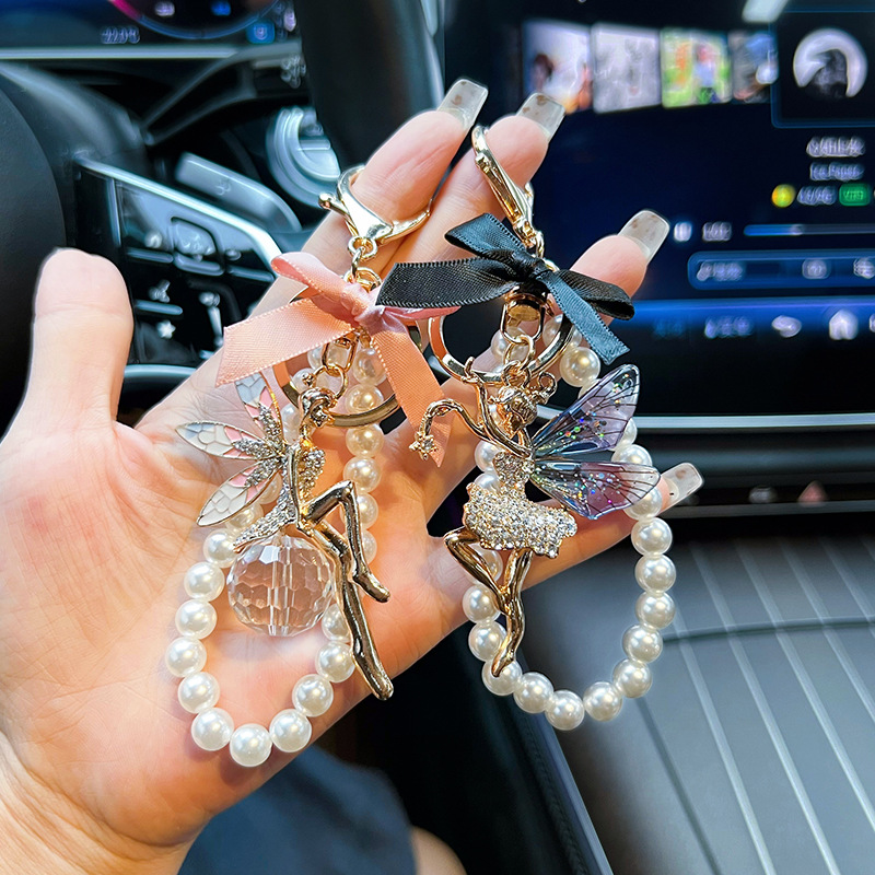 Nueva cadena de perlas arco de aleación de ángel llavero de estilo coreano llavero de automóviles bolsa de chicas colgante