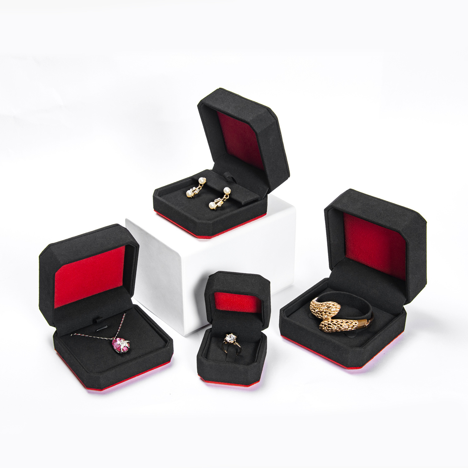 Descuento de fábrica precio al por mayor embalaje de joyería de lujo de alta gama negro rojo microfibra octogonal joyería pulsera collar anillo de bodas caja