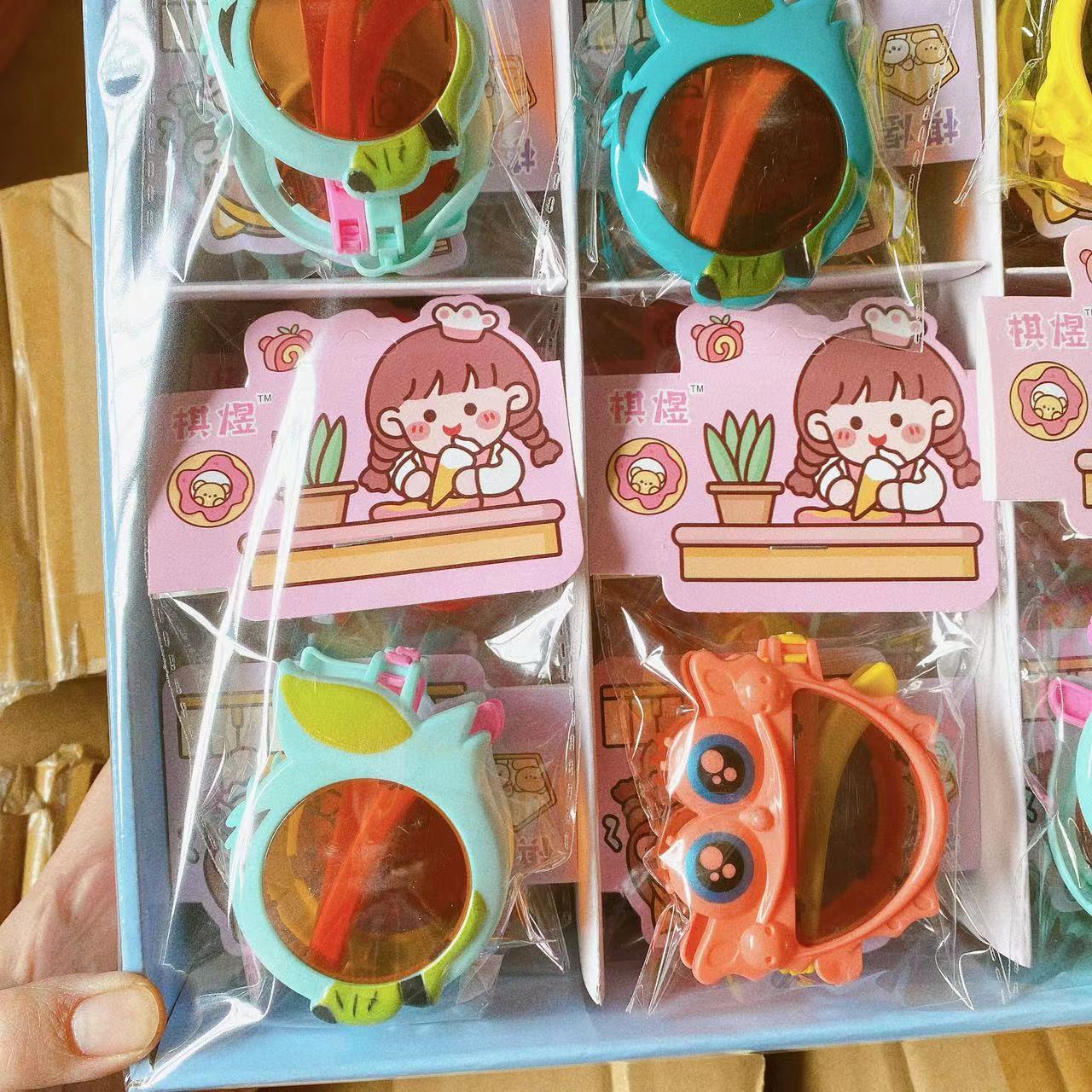 Niños gafas plegables de dibujos animados lindos plásticos embalaje independiente gafas gafas de sol joyas fotográficas al por mayor